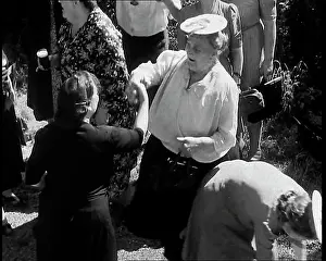 Verge: A Group of British Women Dancing By a Grass