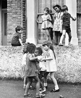 Pleated: Group of children on a Balham street, SW London