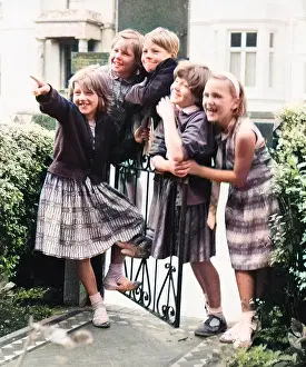 Interested: Group of children at a gate, Balham, SW London