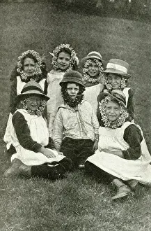 Buttercup: Group of children wearing wild flowers, Somerset, England