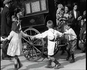 Gurdy: A Group Of Civilian Children Dancing Around