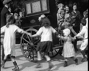 Gurdy: A Group Of Civilian Children Dancing Around