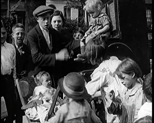 Gurdy: A Group Of Civilian Children Dancing In Front