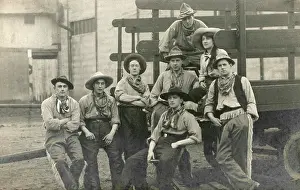 Fasion: A group of cowboys on the back of a truck