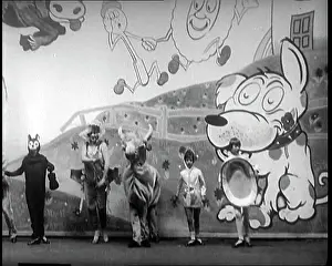 Charleston: A Group of Dancers In Strange Costumes Including
