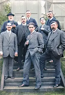 Hatmaking: Group of Edwardian men on garden steps