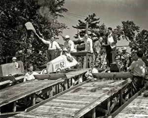 Unpowered: Group of Fathers and Sons at Soap Box Derby Race