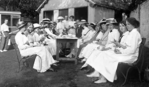 Refinement: Group having tea at Tennis Tournament
