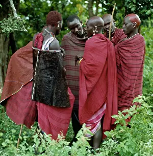 Beadwork: A group of Maasai warriors conversing