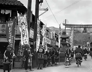 Marcher: Group of Men Advertising Ad Parade Troop Holding