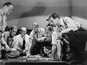 Gamblers: Group of men gambling
