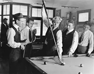 Newsboy: Group of men playing snooker
