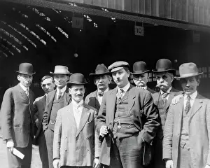 Mid Atlantic: Group of Men in Suits and Hats Standing Looking at Camera