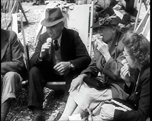 Deckchairs: A Group of Two Men and Two Women Sitting on