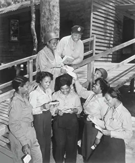 Postal: A group of nurses receiving their first batch