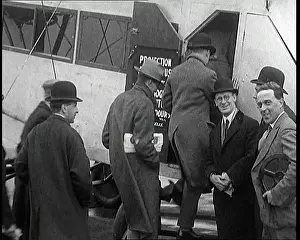 Embarking: A Group of Passengers Embarking Upon A Plane