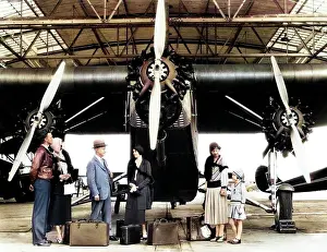Manly: Group of Passengers Waiting in Front of Ford Tri-Motor