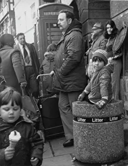 Kiosk: Group of people on a street