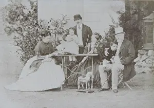 Steiermark: Group portrait of a family around a garden table