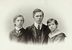 Neckties: Group portrait of a father with his two children
