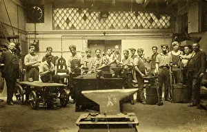 Anvils: Group shot with many workers around an anvil