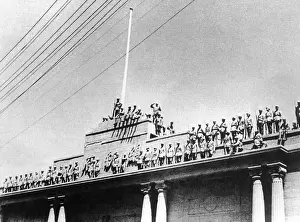 Takeover: A Group of Soldiers Standing in Front of the Office
