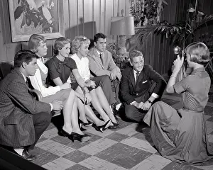 Grades: Group of Teens Sitting on Couch Posing For Photograph