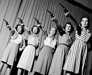 Revolvers: Group Five Women in a Line Aiming Pistols