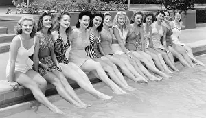 Exhilarating: Group of women sitting in a row at the pool side
