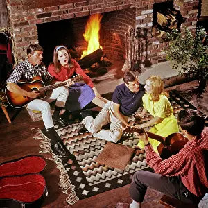 Classic Stock: Group of Young Adults Teens Sitting by Roaring