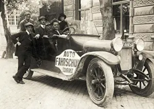 Schranz: Groupportrait in the driving-school car