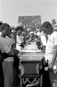 Councillors: Guard of honour around one coffin at a mass funeral
