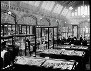 Guide Lecturer with visitors, c.1920