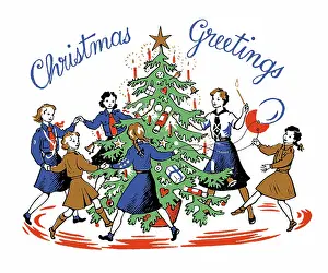 Brownies: Guides and Brownies round Christmas tree