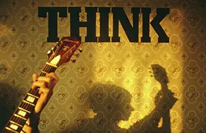 Frets: Guitar player with shadow -- Think