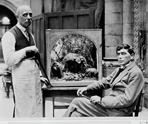 Proboscidean: Guy Dollman with small-scale elephant model, 1927