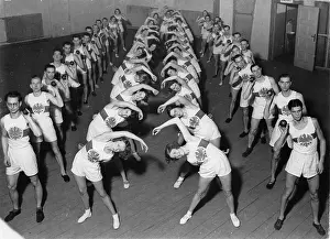 Athlet: Gymnastics at an indoor sport event