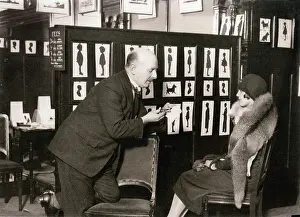 Pettigrew: H. L. Oakley cutting a portrait in his studio