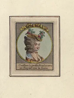 Chapeau: Hairstyle with large curls and a straw hat