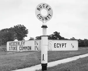 Signposts: HALF A MILE TO EGYPT!