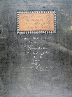 Unconquerable: Hand carved oak plaque entitled Unconquerable