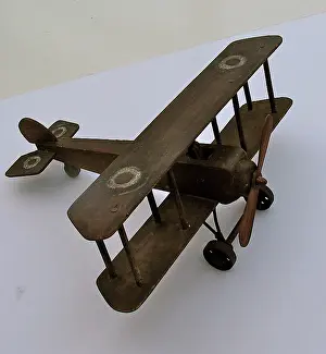 Replicas: A hand-made wooden model of a WWI biplane