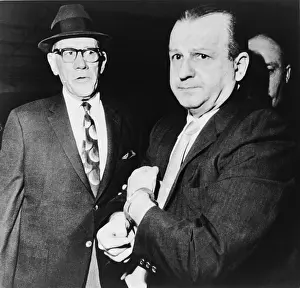 Evaluation: Handcuffed Jack Ruby, killer of JFK assassin ?