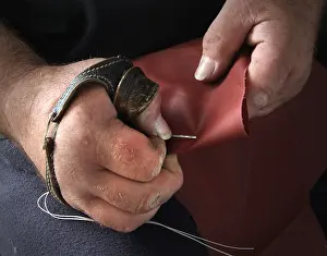 Stitching: The hands of sailmaker William Leitch, in his sail loft