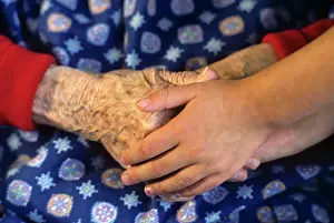 Grandparent: Hands of the Young and Old