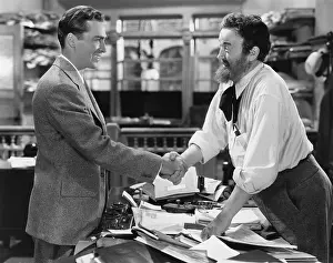 Introductions: Handshake agreement between two men