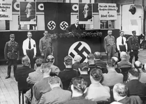 Placards: Hanns Blaschke holding a speech, 1938