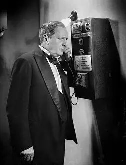 Phones: Hans Moser on the telephone, 1935