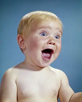 Agape: Happy Blonde Baby Laughing