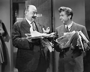 Sheaf: Two happy businessmen